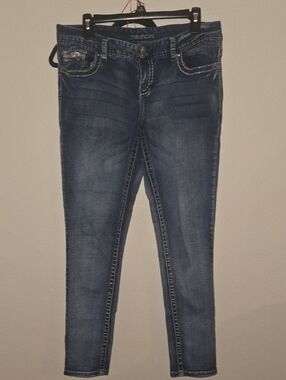 Maurices Dark Blue Skinny Jeans with Faded Detailing